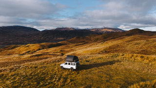 Land rover Defender camping in the Scottish Highlands